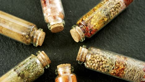 bottles of various spices 4k