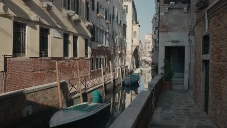 secluded venetian alley and canal, italy