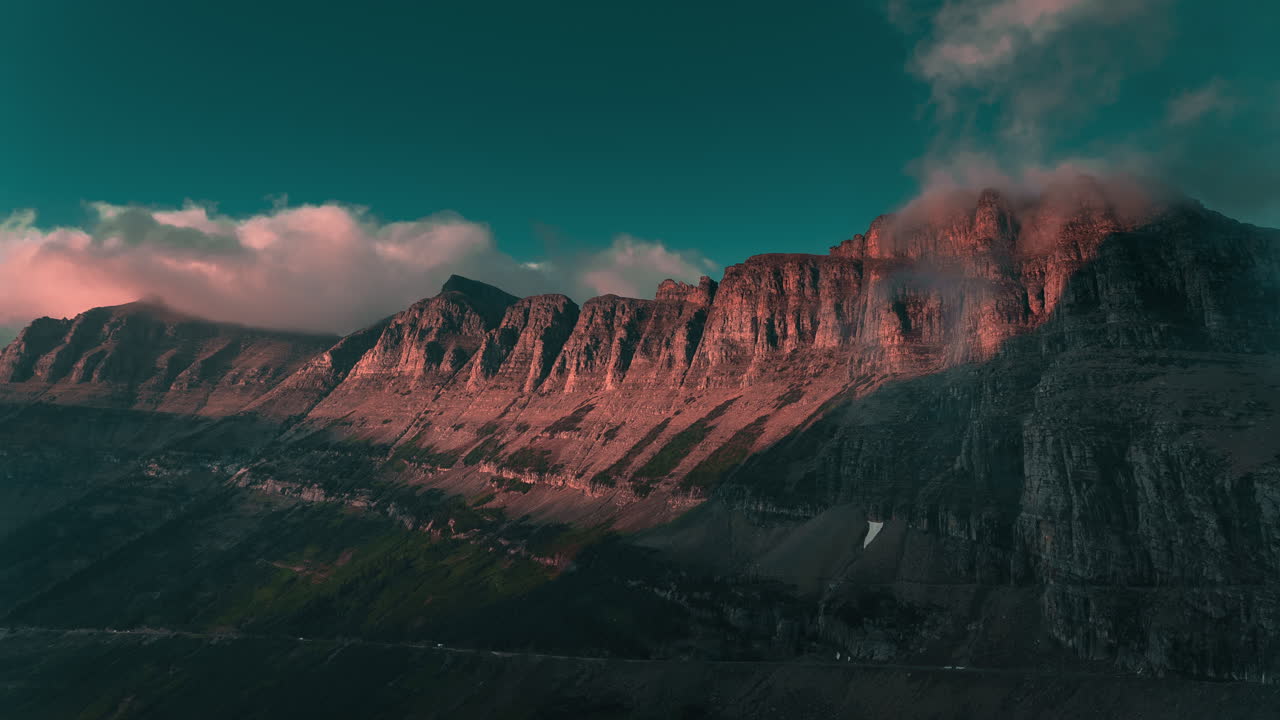 Montana mountain timelapse with clouds rolling over rocky peaks