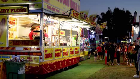 people enjoying food stalls at night