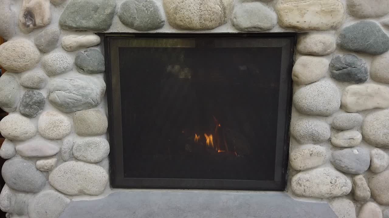 Burning fire place between rocks