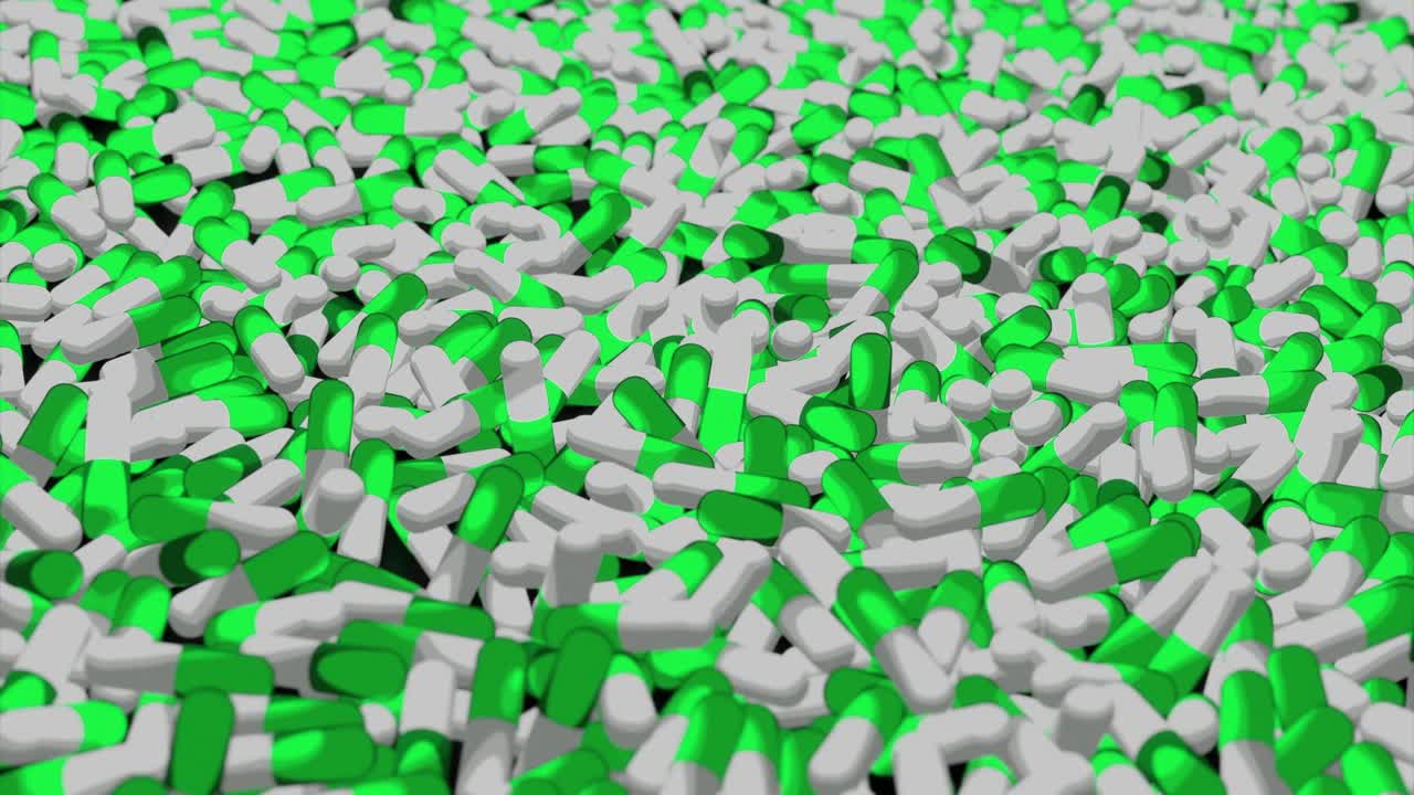 primer plano de una pila de pastillas verdes y blancas