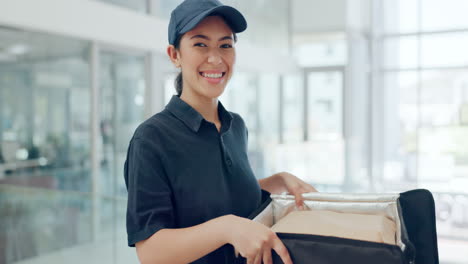 smiling food delivery person with order