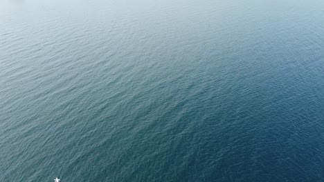 Drone-shot-of-cruise-shot-heading-towards-island