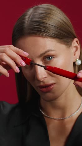 woman applying makeup