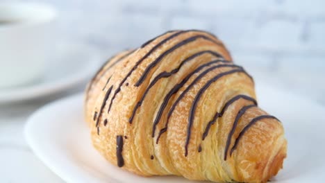 chocolate croissant with coffee