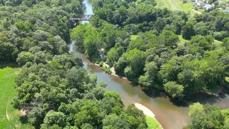 aerial drone view of creek during sunny day