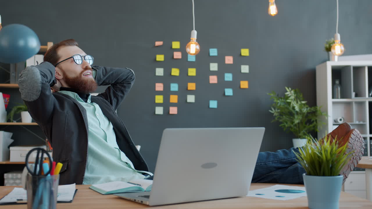 Relaxed Businessman in Modern Office