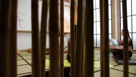 women doing yoga indoors