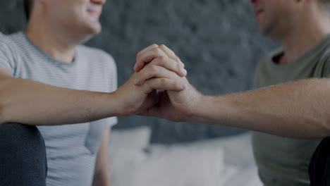 Happy Gay Couple Holding Hands