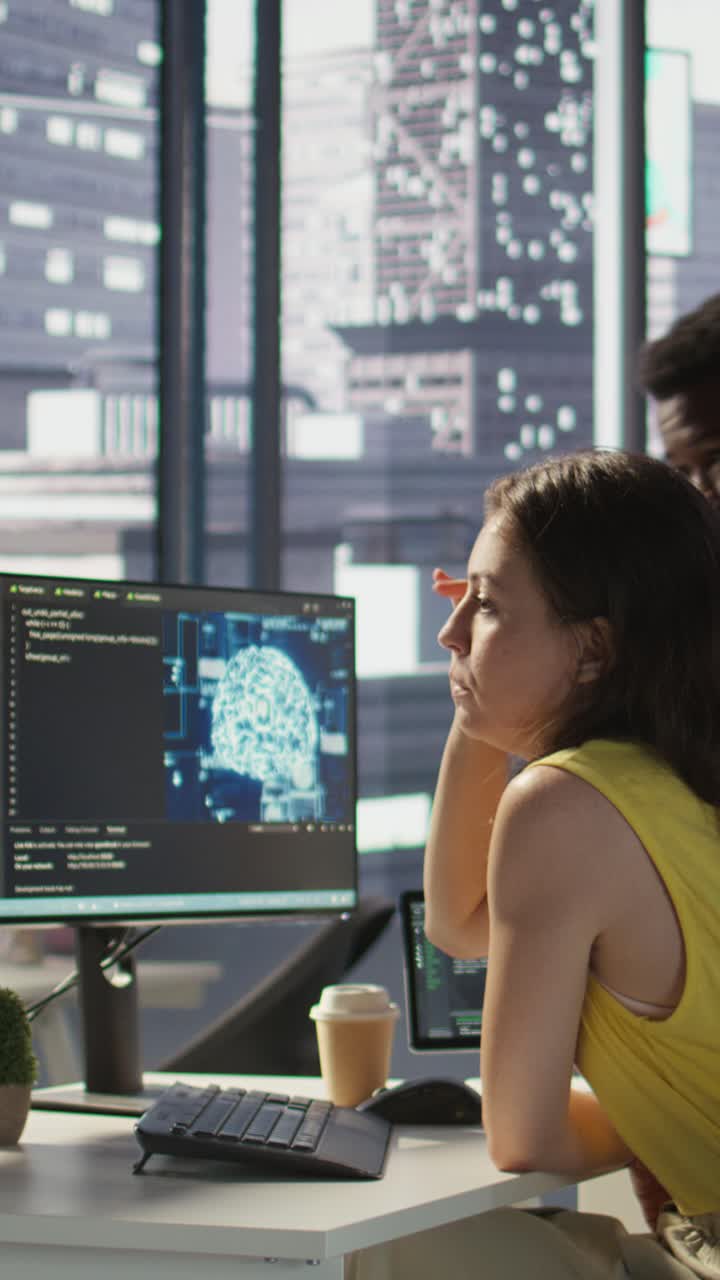 Vertical video Employee using AI technology to design machine learning algorithms