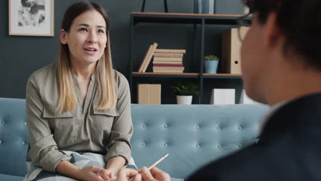patient talking to a doctor in therapy session