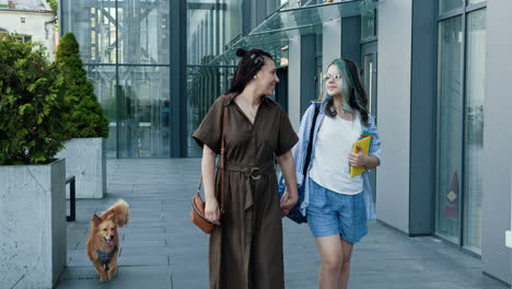 mother and daughter walking to school