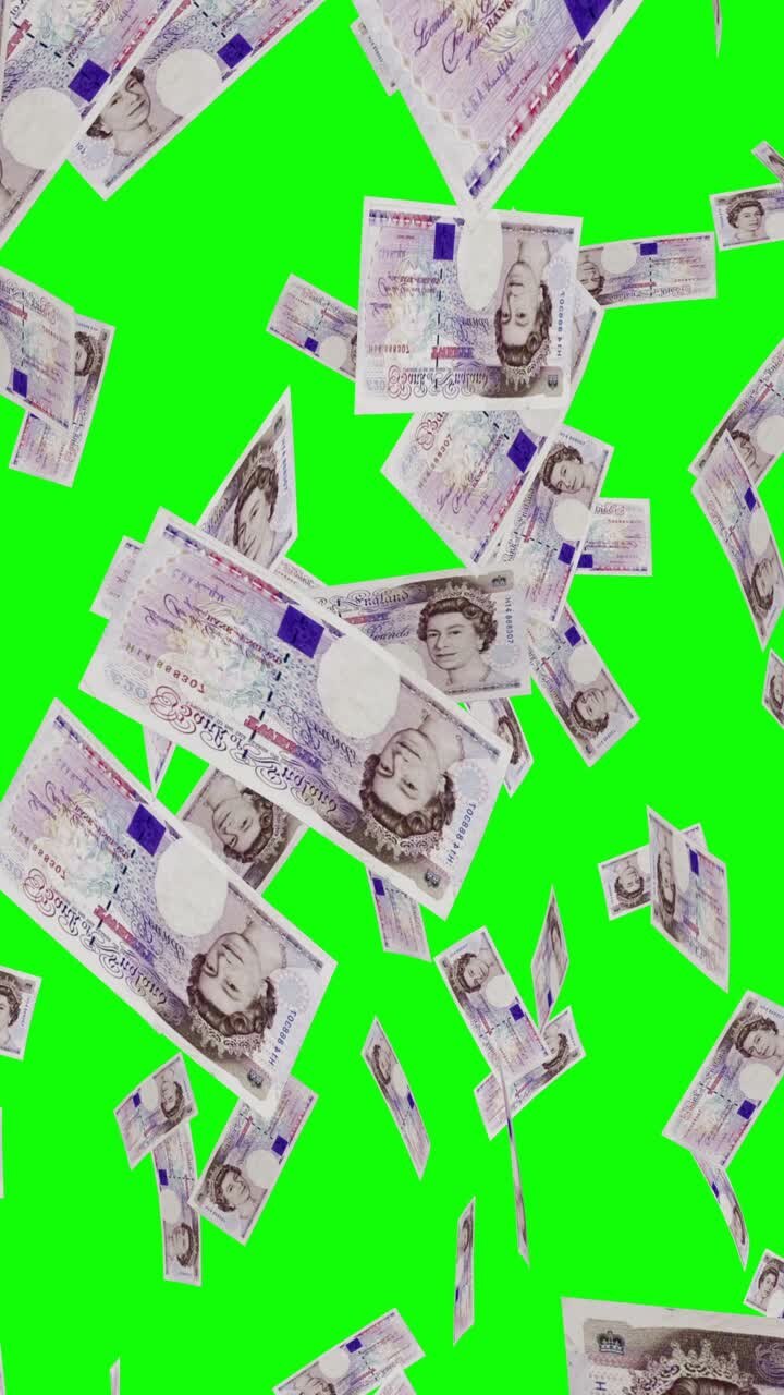 los billetes de libra británica que caen en la pantalla verde