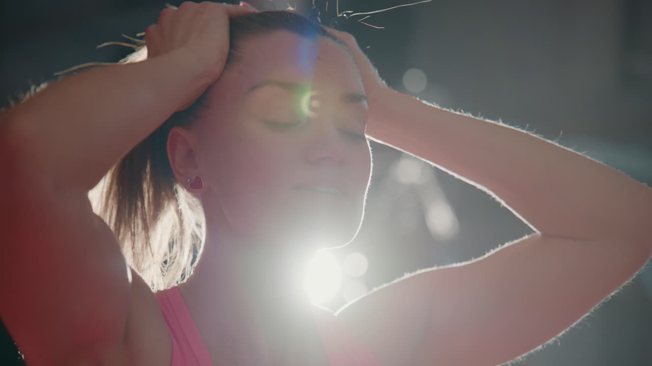 Close-up of Tired Woman Sweating After Intense Workout in Gym