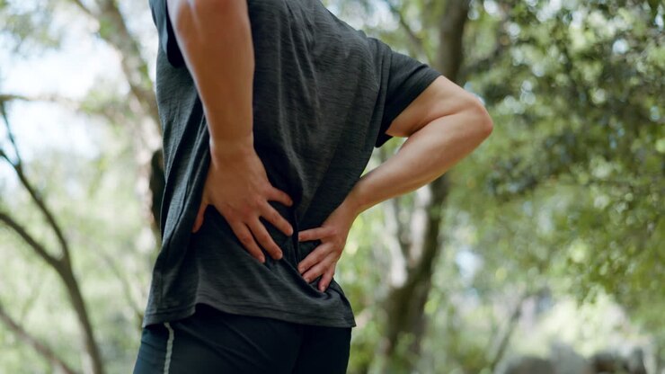 Running, fitness injury and man with back pain