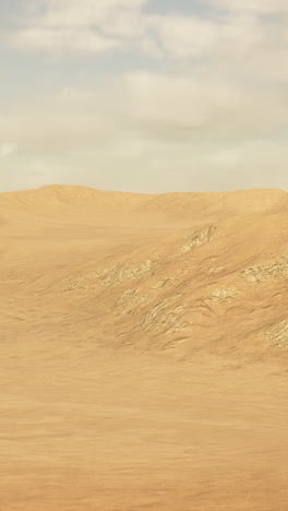 desert landscape with sand dunes and mountains