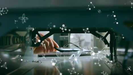 animation of molecules floating over male scientist