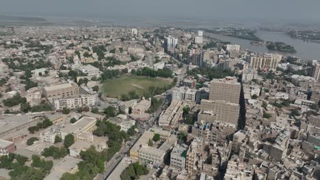 aerial cityscape of sukkur near indus river, sindh