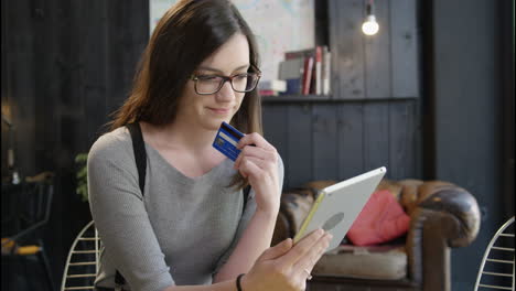 woman online shopping with tablet and