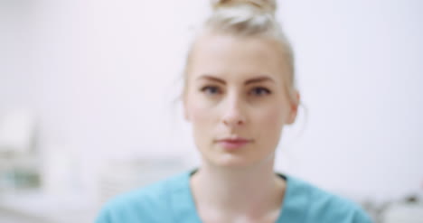 Beautiful-Portrait-Of-Female-Doctor-Wearing-Glasses-At-Healthcare-Clinic