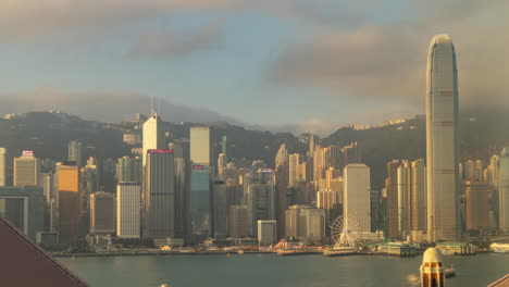hong kong - 19 march 2025 : timelapse of the hong kong skyline and victoria harbour from a high vantage point