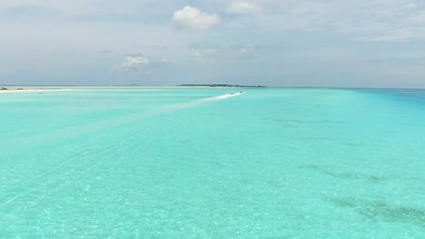 laguna azul playa de arena blanca paisaje de maldivas atolón agua turquesa del océano índico