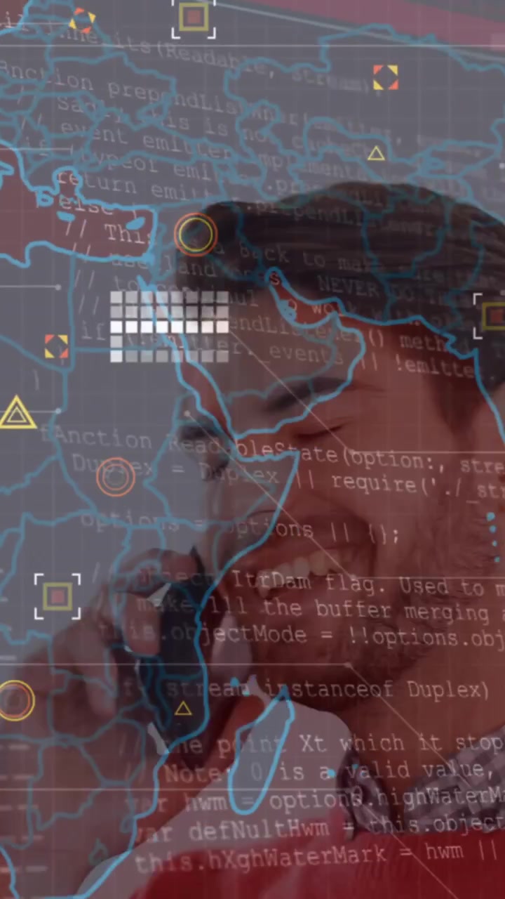 Animation of data processing over world map against caucasian man talking on smartphone
