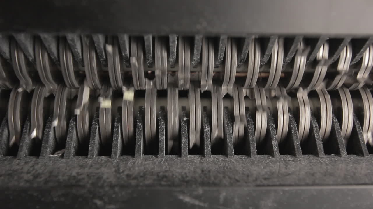 Shredder Cutting Paper From Below, Single Sheet