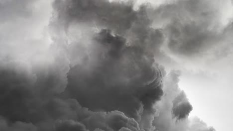 Lightning-strikes-between-thick-and-dark-clouds