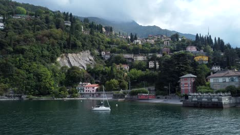 Drone-shot-beautiful-coastal-town-in-Italy-with-beach-and-ocean