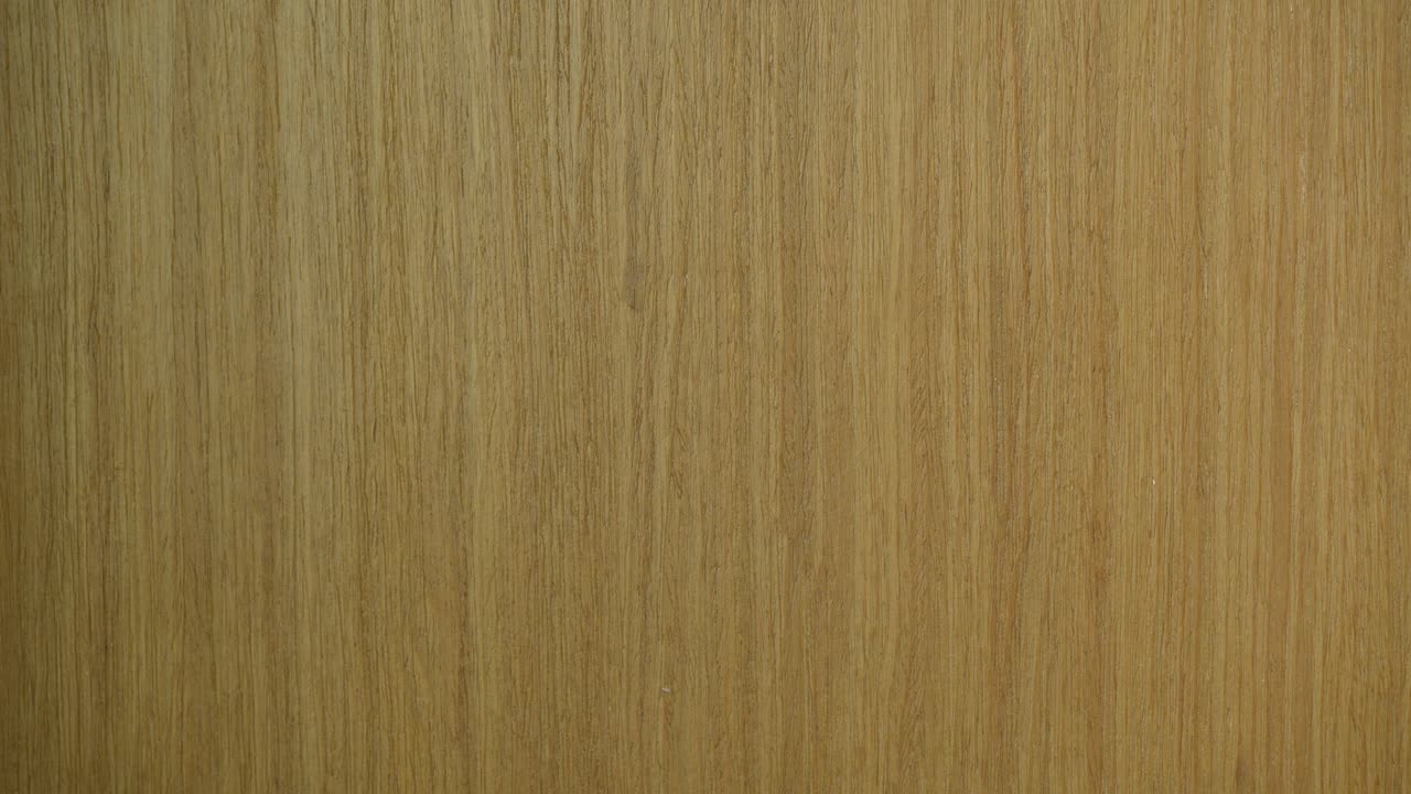 Hand seen placing a sticky note on a door that says "picking up the kids" - pink paper note displays break message