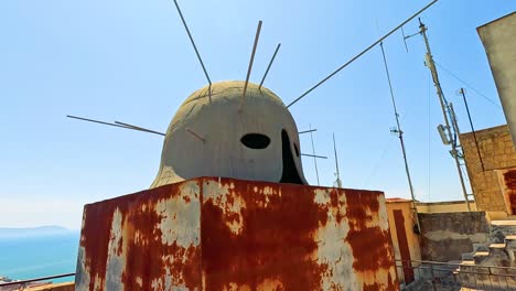 rusty structure with helmet and spear in naples