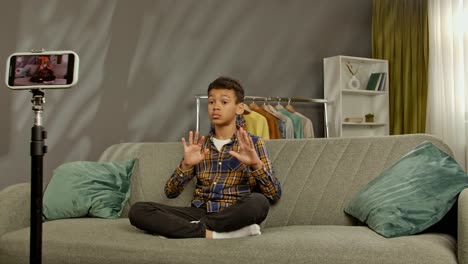 teenager vlogging on a couch