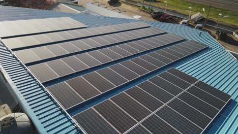 Aerial-view-of-solar-panels-on-a-rooftop,-renewable-energy,-sustainable-electricity