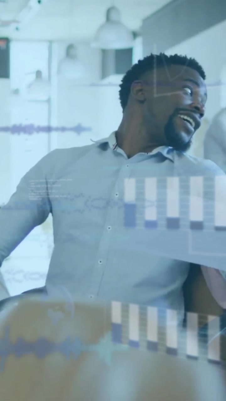 Animation of data processing over diverse colleagues discussing work in office