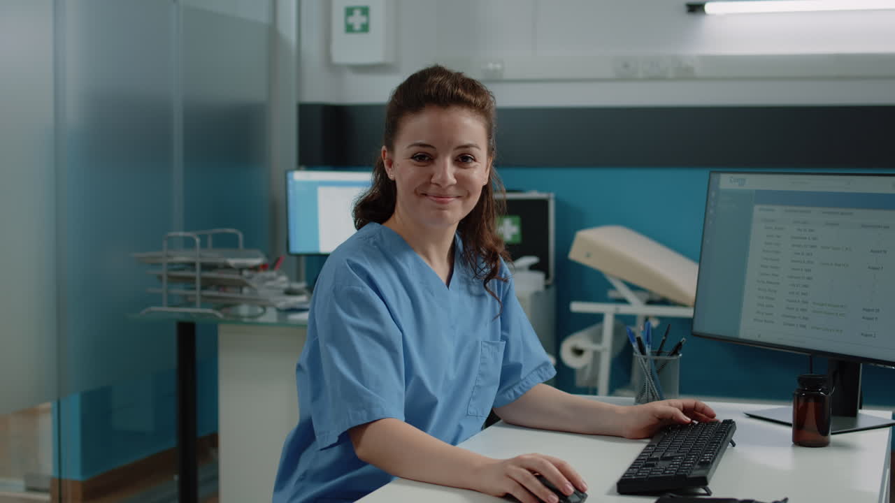 Medical professional working on a computer in a clinic