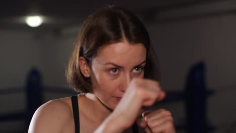 girl boxer winds bandages before a fight girl boxer winds bandages before a fight womens boxing