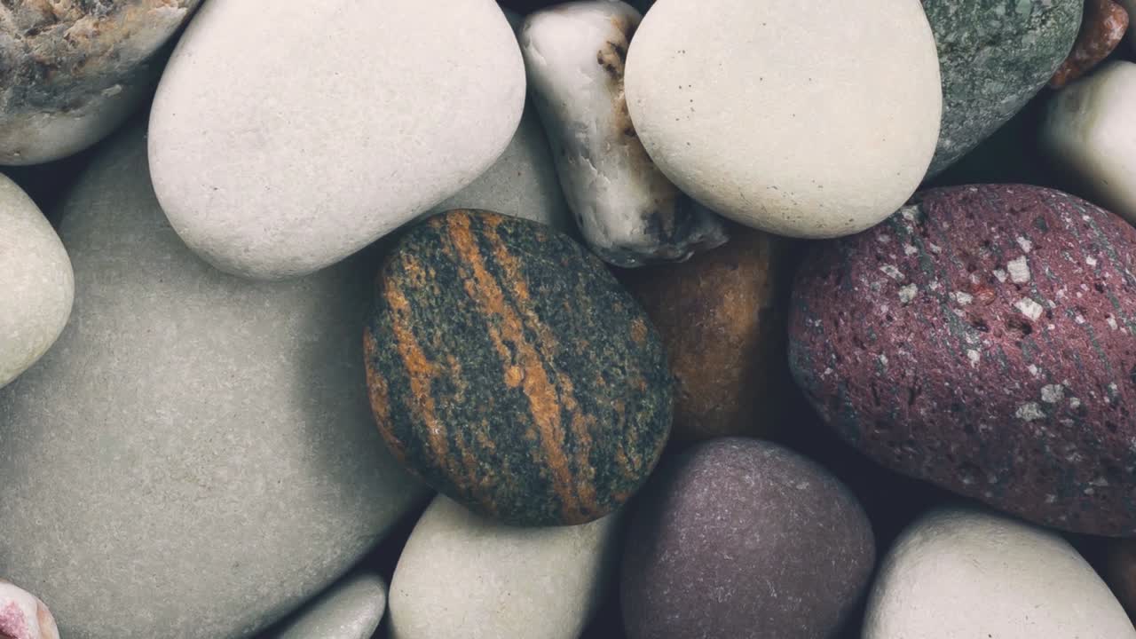 Rotating pebbles background.