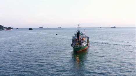 huge oil tanker navigating near port of balikpapan in kalimantan, indonesia