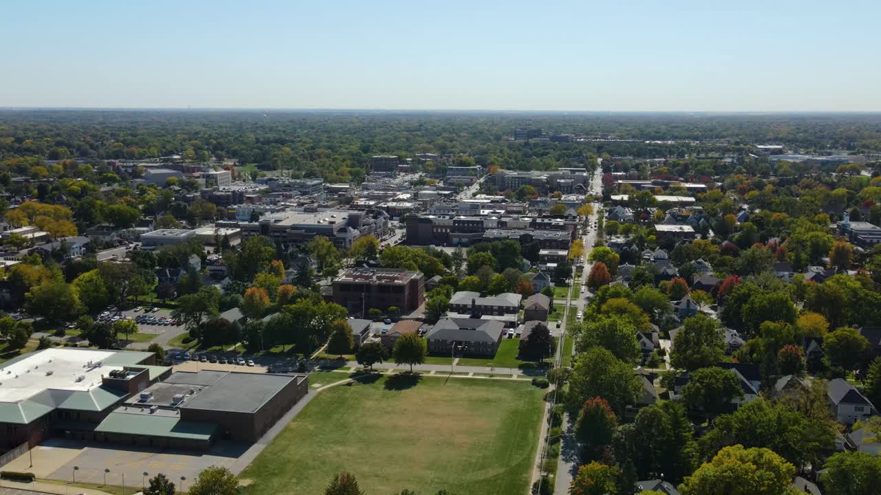Naperville, IL, a Chicago suburb, on a sunny fall day, featuring buildings, streets. Crane Down Right Day S
