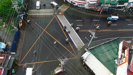 top down aerial view rain water flooded the highways all over the dagupan city, philippines