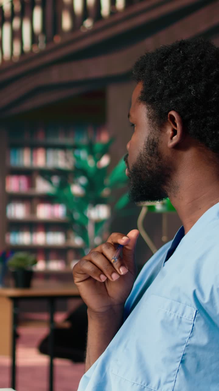 African American Medical Students Studying and Working in a Library