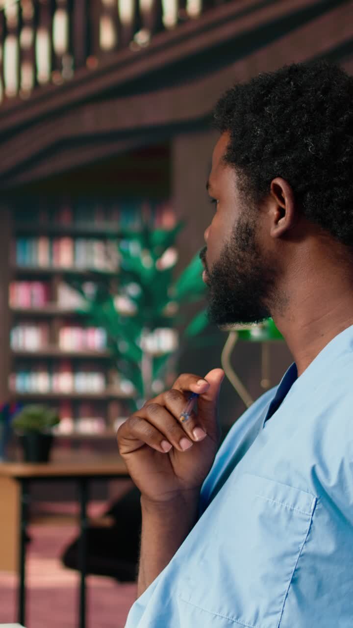 African American Medical Students Studying and Working in a Library