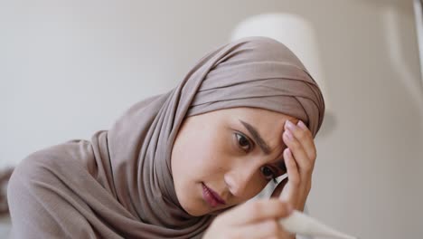 woman checking her temperature