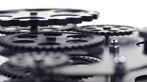 close up shot of  black gear cogs rotating