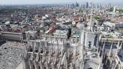 stately milan cathedral and piazza duomo admired by tourists