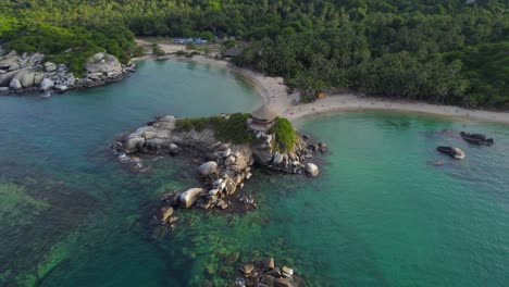 stunning aerial view of cabo de san juan beach in tayrona national park at sunset