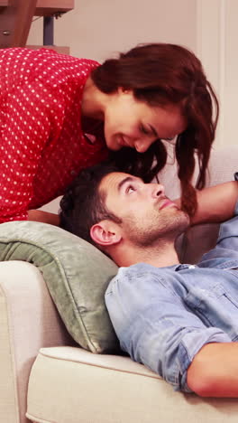 woman kissing boyfriends forehead