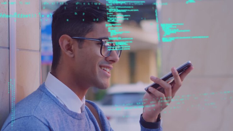 Uomo che per mezzo del telefono cellulare